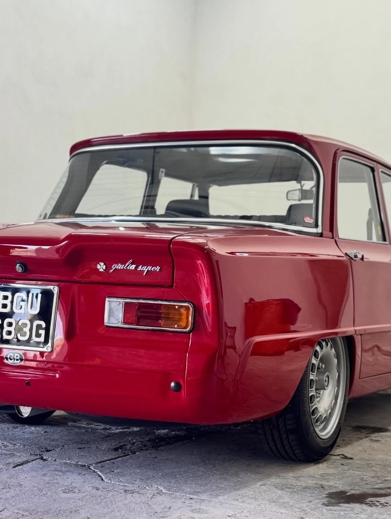 Classic red Alfa Romeo Giulia Super rear with a deep gloss finish