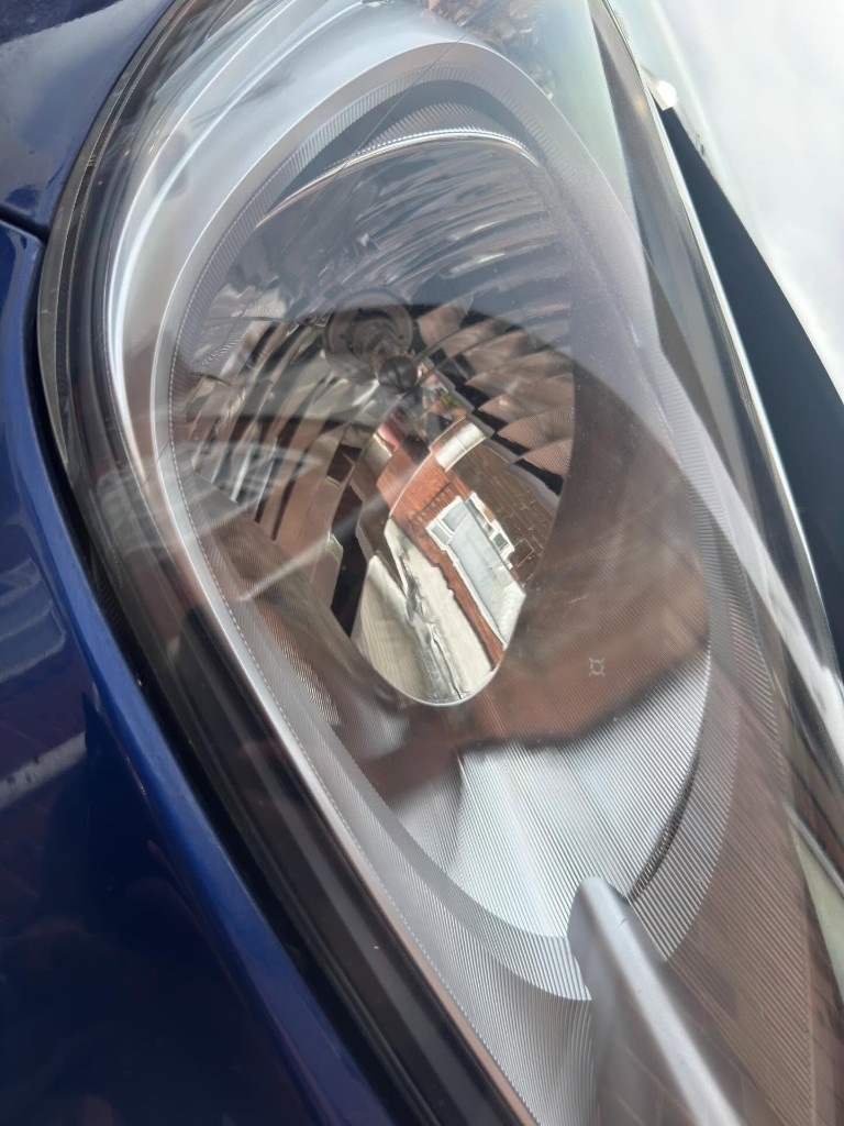 Clear, polished headlight after restoration
